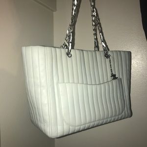 CHANEL Lambskin Vertical Quilted Mademoiselle Tote